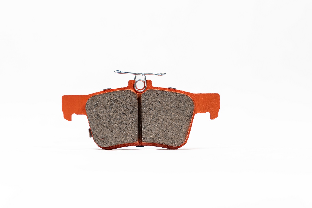 rear orange brake pad