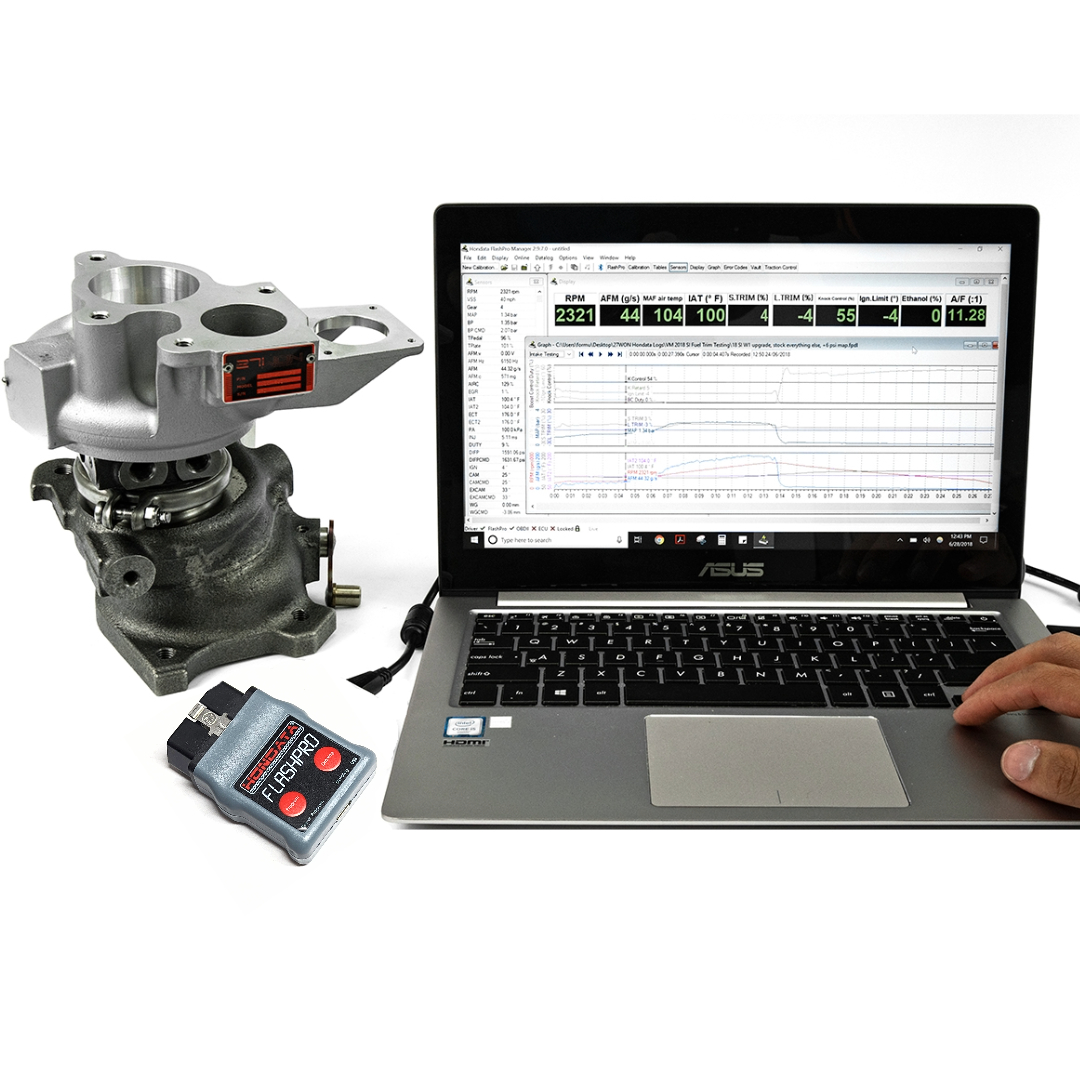 laptop-with-honda-tuning-software-next-to-drop-in-turbocharger