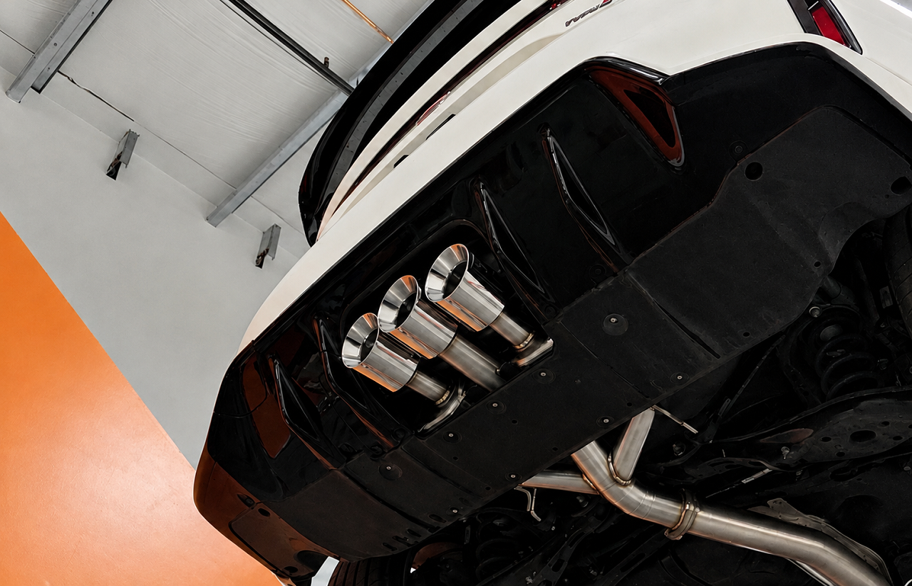triple rear tips in polished finish