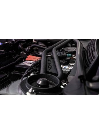 Seamless fit over OEM battery location