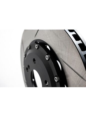 Slotted and vented rotors to aid in cooling under heavy braking