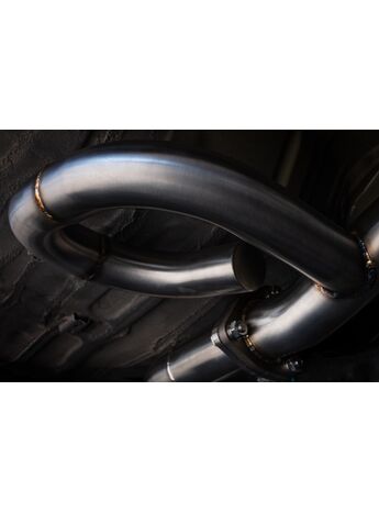 These dead tubes cycle exhaust back into the main stream to cancel out raspiness and drone and up the rumble and tone