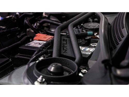 Seamless fit over OEM battery location