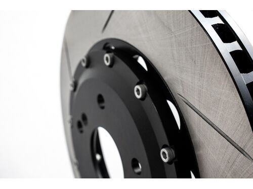 Slotted and vented rotors to aid in cooling under heavy braking