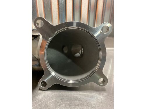 HUGE!!! 95mm opening to reduce backpressure and have a greater pressure delta across the turbine housing and downpipe inlet
