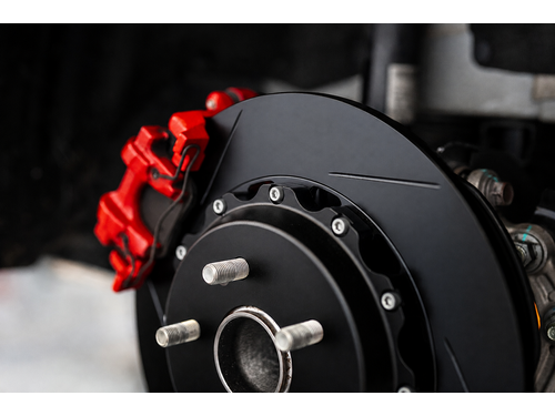 Zinc coated rotors prevent corrosion during shipping and wear off within 250 miles of use
