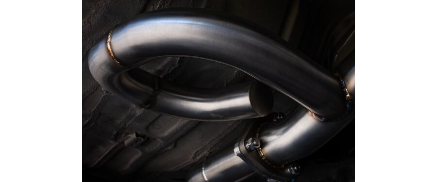 These dead tubes cycle exhaust back into the main stream to cancel out raspiness and drone and up the rumble and tone